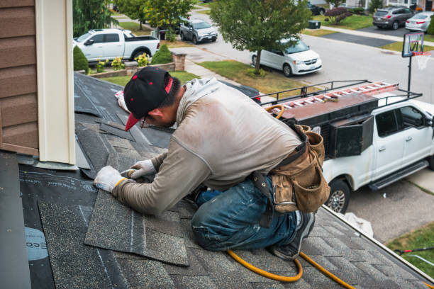 Professional Roofing technician working in Merion Station, PA